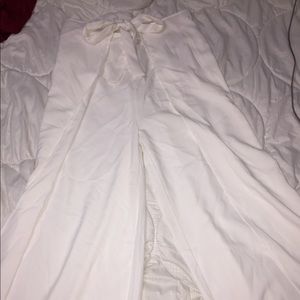 Elegant white pants with cover over